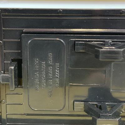 LOT:167: Assortment of 5 Hess Toy Trucks Featuring 1986 Toy Fire Truck and 1987 Toy Truck Bank with Barrels, 1999 Truck and Space...