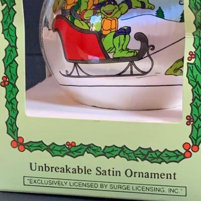 LOT:170: Collection of Christmas Ornaments Including Teenage Mutant Ninja Turtles Bulb, Curious George, McDonalds, Hershey's and More