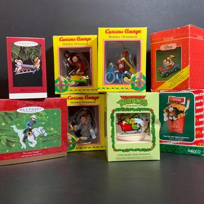 LOT:170: Collection of Christmas Ornaments Including Teenage Mutant Ninja Turtles Bulb, Curious George, McDonalds, Hershey's and More