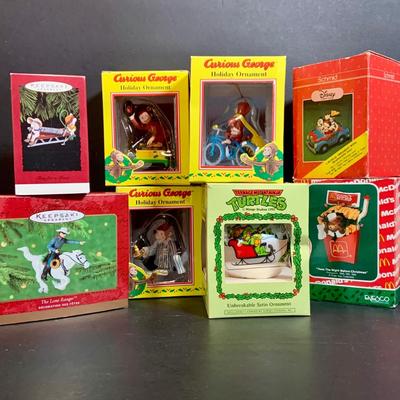 LOT:170: Collection of Christmas Ornaments Including Teenage Mutant Ninja Turtles Bulb, Curious George, McDonalds, Hershey's and More