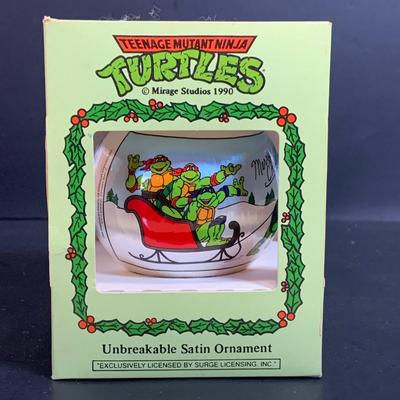 LOT:170: Collection of Christmas Ornaments Including Teenage Mutant Ninja Turtles Bulb, Curious George, McDonalds, Hershey's and More