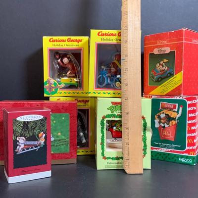 LOT:170: Collection of Christmas Ornaments Including Teenage Mutant Ninja Turtles Bulb, Curious George, McDonalds, Hershey's and More
