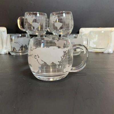 LOT:173: Assortment of Vintage Mugs and More Featuring (8) Nescafe World Mugs (2) in Original Styrofoam, (4) RCA Nippwe Mugs, a Jelly...