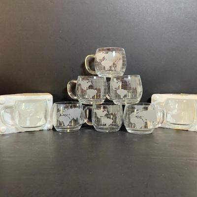 LOT:173: Assortment of Vintage Mugs and More Featuring (8) Nescafe World Mugs (2) in Original Styrofoam, (4) RCA Nippwe Mugs, a Jelly...