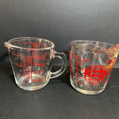 LOT:175: The Mid-century Kitchen Must Haves, Including Tupperware Lidded Mugs and Salt and Pepper Shakers a Microwave Steamer, Fire King...