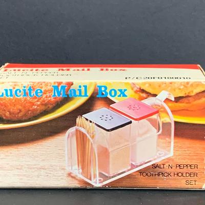 LOT:175: The Mid-century Kitchen Must Haves, Including Tupperware Lidded Mugs and Salt and Pepper Shakers a Microwave Steamer, Fire King...