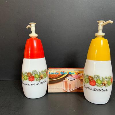 LOT:175: The Mid-century Kitchen Must Haves, Including Tupperware Lidded Mugs and Salt and Pepper Shakers a Microwave Steamer, Fire King...