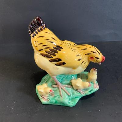 LOT:177: Extra Large Country Kitchen Lot Including Chicken Covered Bowl and 4 Egg Shaped Trinket Boxes Floral Trivets, Dishes and More