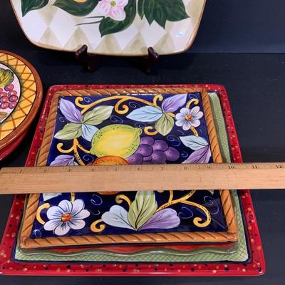 LOT:177: Extra Large Country Kitchen Lot Including Chicken Covered Bowl and 4 Egg Shaped Trinket Boxes Floral Trivets, Dishes and More