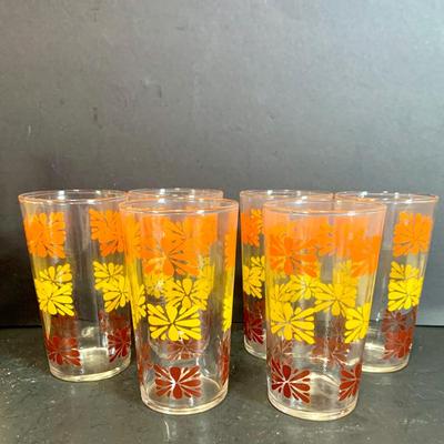 LOT:180: Mid-Century Orange Kitchen Including a Peacock Hot/Cold Twin Air Pot Vacuum Thermos, 70' Style Drinking Glasses and Napkin...