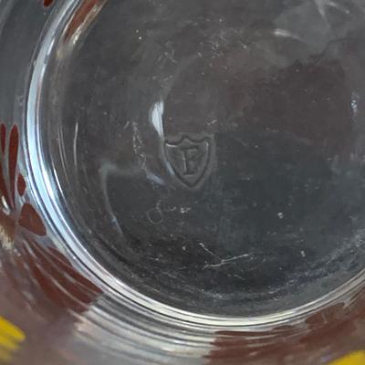 LOT:180: Mid-Century Orange Kitchen Including a Peacock Hot/Cold Twin Air Pot Vacuum Thermos, 70' Style Drinking Glasses and Napkin...