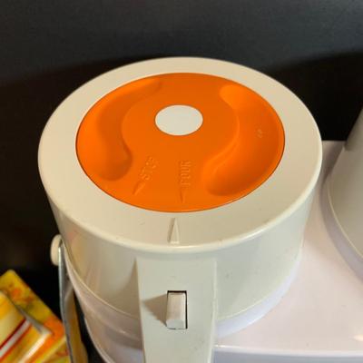 LOT:180: Mid-Century Orange Kitchen Including a Peacock Hot/Cold Twin Air Pot Vacuum Thermos, 70' Style Drinking Glasses and Napkin...