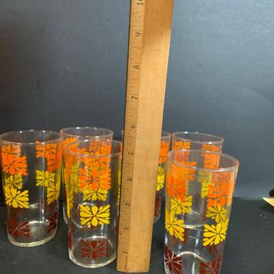 LOT:180: Mid-Century Orange Kitchen Including a Peacock Hot/Cold Twin Air Pot Vacuum Thermos, 70' Style Drinking Glasses and Napkin...