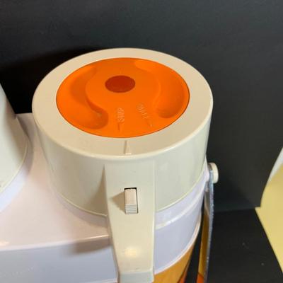 LOT:180: Mid-Century Orange Kitchen Including a Peacock Hot/Cold Twin Air Pot Vacuum Thermos, 70' Style Drinking Glasses and Napkin...
