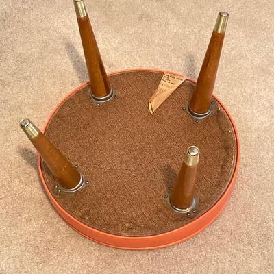 LOT 219: Mid-Century Modern Art, Orange Peg Leg Foot Stool (Babcock Phillips Corporation) and Circle / Dot Fabric