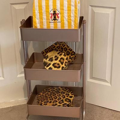 LOT 220: Three Tier Rolling Cart, Giorgio Beverly Hills Style Folding Travel Bag and Four Animal Print Storage Boxes