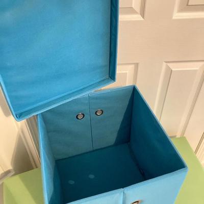 LOT 221: Three Vintage Square Cube Style Storage Containers and Circular Storage Box