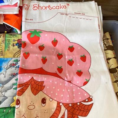 LOT 222: Sewing Collection - Fabric (Vintage / Novelty and More), Storage Containers, Spool Holders and Sewing Guide Book