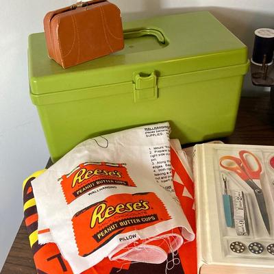 LOT 222: Sewing Collection - Fabric (Vintage / Novelty and More), Storage Containers, Spool Holders and Sewing Guide Book