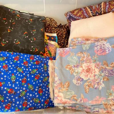 LOT 222: Sewing Collection - Fabric (Vintage / Novelty and More), Storage Containers, Spool Holders and Sewing Guide Book