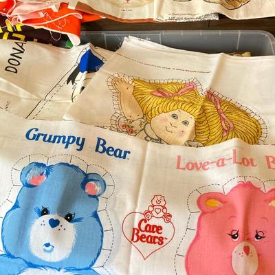 LOT 222: Sewing Collection - Fabric (Vintage / Novelty and More), Storage Containers, Spool Holders and Sewing Guide Book