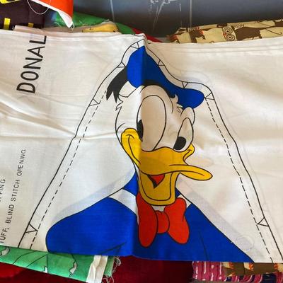 LOT 222: Sewing Collection - Fabric (Vintage / Novelty and More), Storage Containers, Spool Holders and Sewing Guide Book