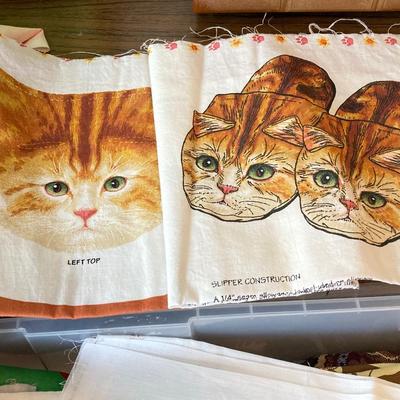 LOT 222: Sewing Collection - Fabric (Vintage / Novelty and More), Storage Containers, Spool Holders and Sewing Guide Book