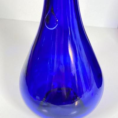 LOT 234: Decorative Collection - Cobalt Blue Bottles (Italy Acqua della Madonna), Calla Lily Candle Holders, Glass Coasters and More