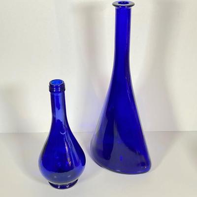 LOT 234: Decorative Collection - Cobalt Blue Bottles (Italy Acqua della Madonna), Calla Lily Candle Holders, Glass Coasters and More
