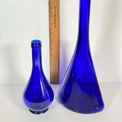 LOT 234: Decorative Collection - Cobalt Blue Bottles (Italy Acqua della Madonna), Calla Lily Candle Holders, Glass Coasters and More