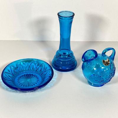 LOT 235: Blue and Red Glass Decorative Collection