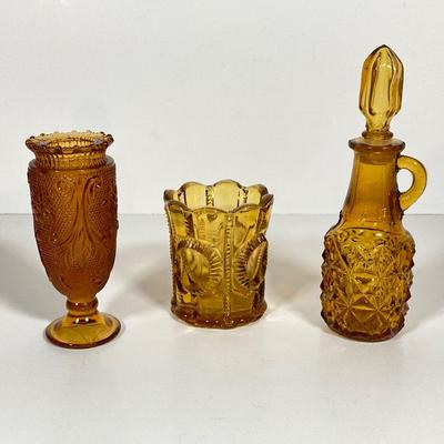LOT 236: Amber Glass Collection - Candlestick Holders, MCM Ngori Italy Glass Grapes Salt & Pepper Shakers, Round Cut Glass Serving...