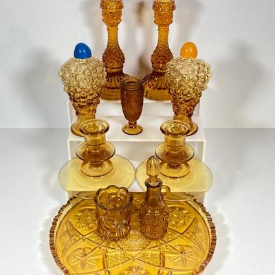 LOT 236: Amber Glass Collection - Candlestick Holders, MCM Ngori Italy Glass Grapes Salt & Pepper Shakers, Round Cut Glass Serving...
