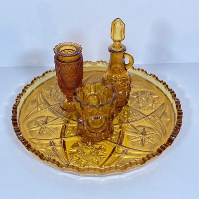 LOT 236: Amber Glass Collection - Candlestick Holders, MCM Ngori Italy Glass Grapes Salt & Pepper Shakers, Round Cut Glass Serving...