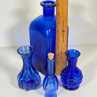LOT 237: Collection of Amazing Blue Glass Vases