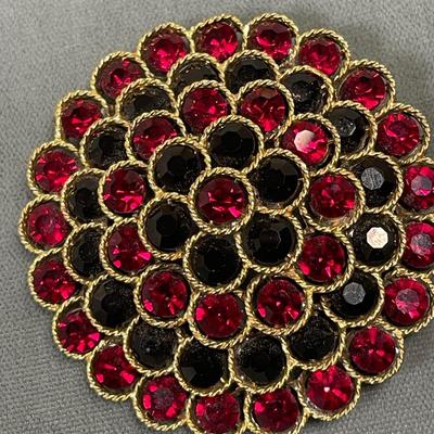 Lisner red and black rhinestone brooch