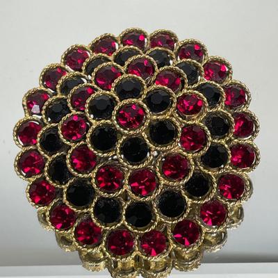 Lisner red and black rhinestone brooch