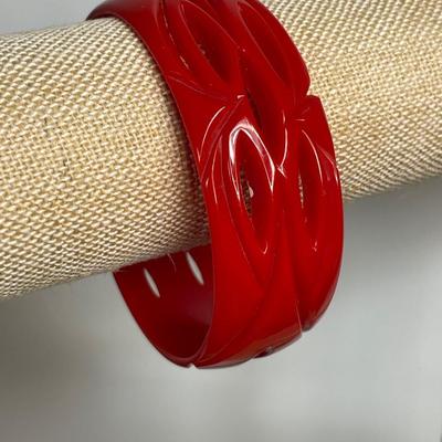 Vintage Cherry Red Carved and Pierced Bakelite bangle bracelet