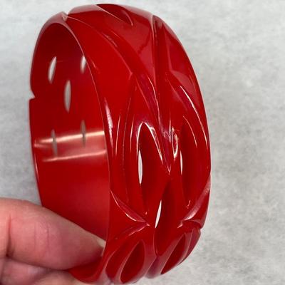 Vintage Cherry Red Carved and Pierced Bakelite bangle bracelet