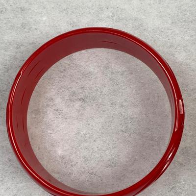 Vintage Cherry Red Carved and Pierced Bakelite bangle bracelet