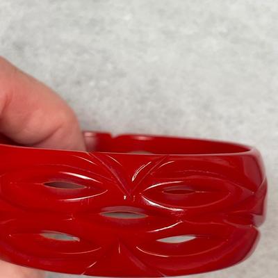 Vintage Cherry Red Carved and Pierced Bakelite bangle bracelet