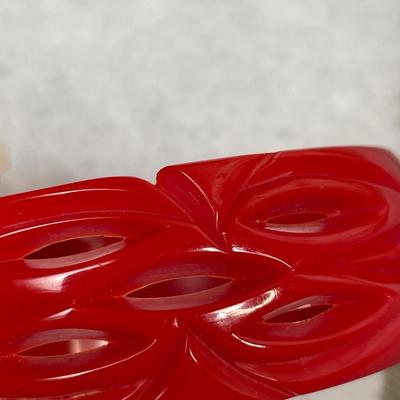 Vintage Cherry Red Carved and Pierced Bakelite bangle bracelet