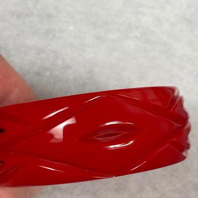 Vintage Cherry Red Carved and Pierced Bakelite bangle bracelet