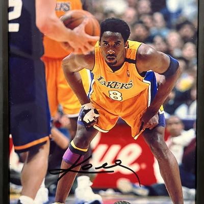 Kobe Bryant signed photo. SCM authenticated