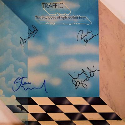 Traffic signed The Low Spark Of High Heeled Boys album