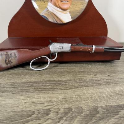 LOT 18B: John Wayne Heroic Legend Plate w/ Replica Rifle Display & Hamilton Collection John Wayne, The American Legend Platinum...