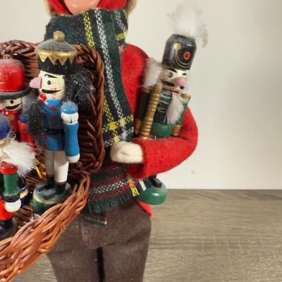 LOT 20B: Byers Choice Carolers - Man w/ Nutcrackers, Rose's Tea Shop Board & Candle Holders