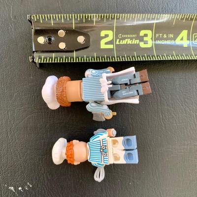 LOT 55 L: The Muppets Collection: 2017 Christmas Carol Ornaments, Statler & Waldorf w/ Balcony Figures, & Lego Figures