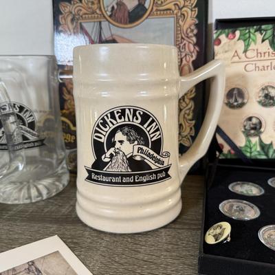 LOT 110L: Charles Dickens A Christmas Carol Coins, Postcards & Dickens Inn Souvenir Mugs