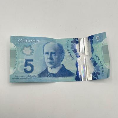 LOT 123J: Canadian Currency - Around 79.84 CAD